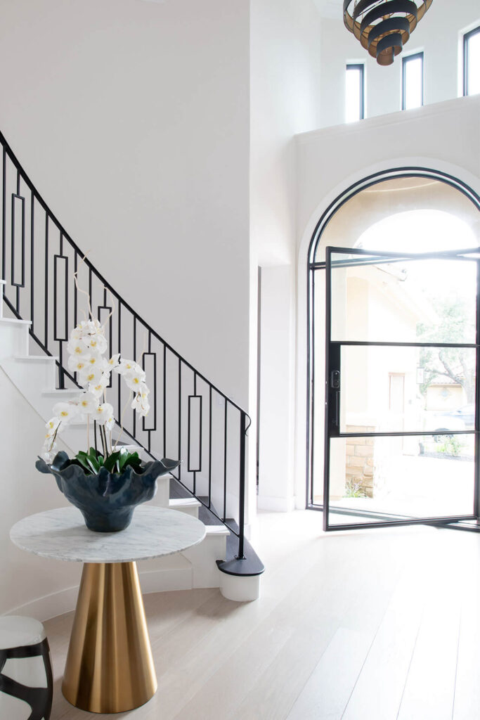 Stunning entryway of steel and glass in UT Golf Club
